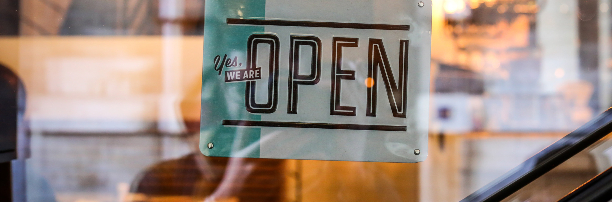 Yes we are Open sign. Photo by Alexandre Godreau on Unsplash