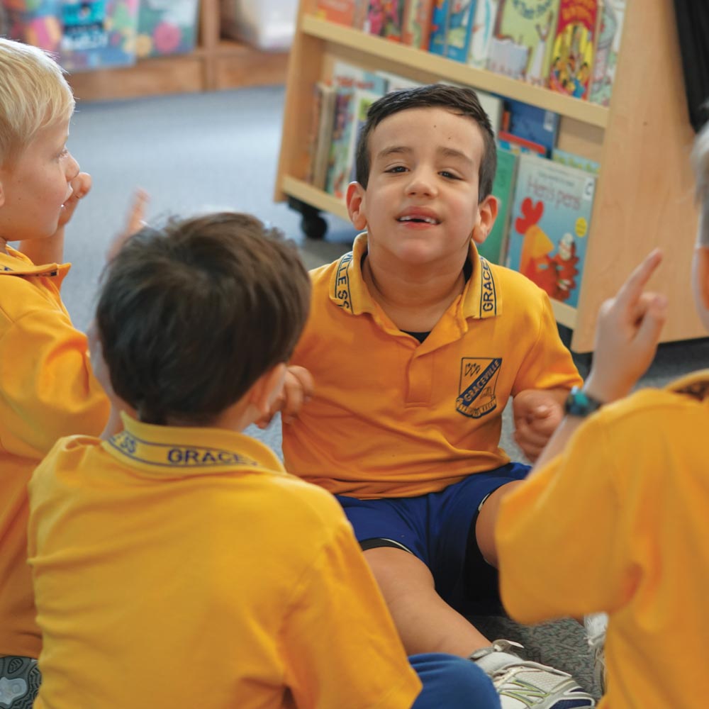 Young boy with disability smiling at camera