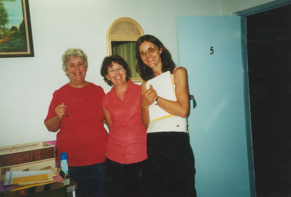 Three women together smiling