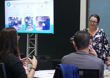 Lindie Brengmann presenting at a workshop to a group of families