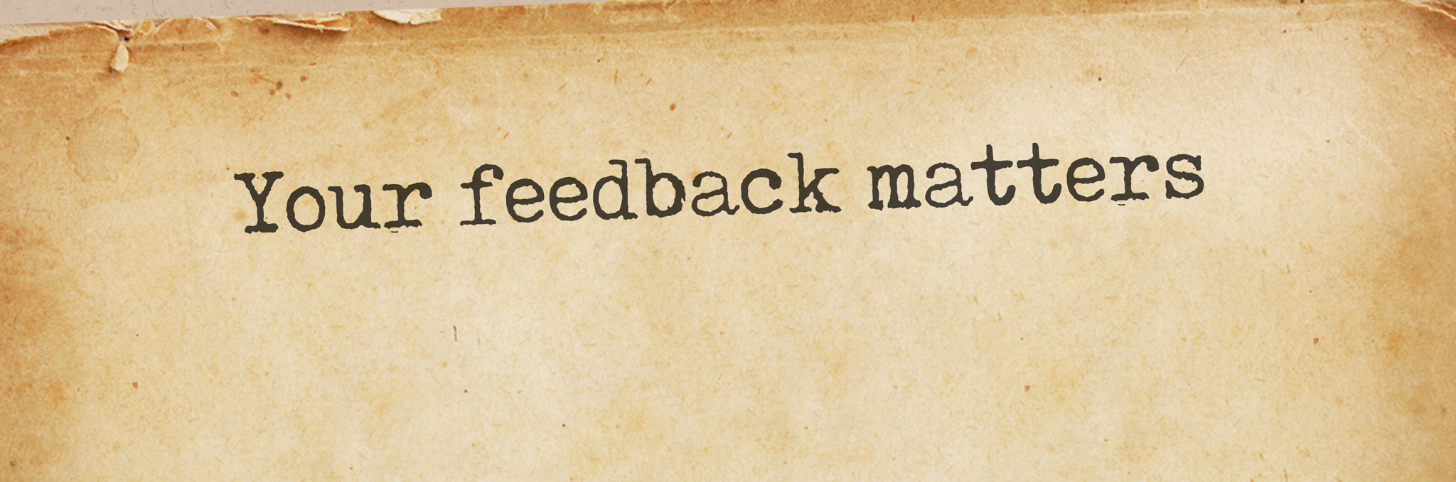 An old piece of paper with typewritten words: Your feedback matters
